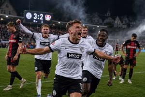 SV Elversberg schockt Bayer: Das Dorf-Wunder hat System | Symbolbild KI-generiert © 2026 EMH AG JS by OpenAI 5.5